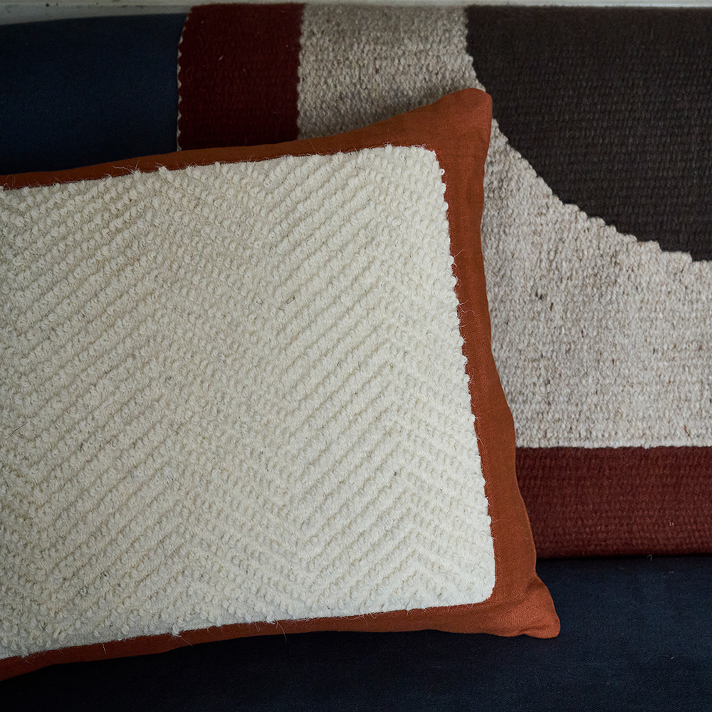 Hand-Woven Hilda Cushion – Terracotta - The Garnered Nancy Nicholson Studio Hilda Tapestry Bolster Styled