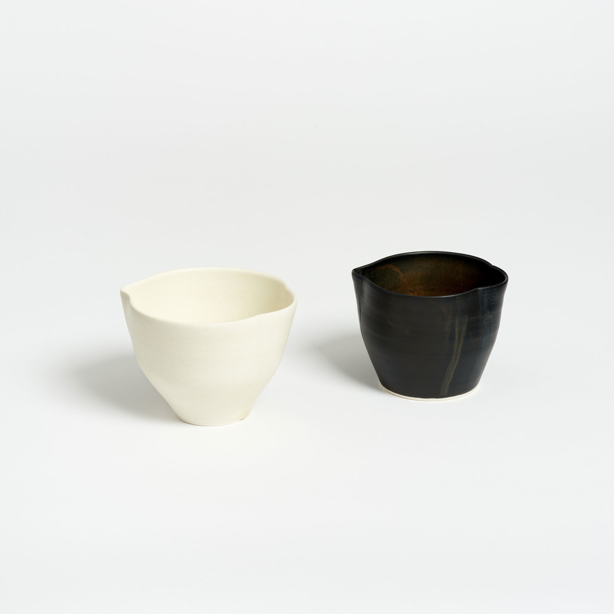Pair of Hand-Thrown Porcelain Pouring Jugs – Black & Cream - The Garnered Olivia Horley Ceramics Cream Black Jugs